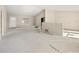 A living room under construction, featuring large windows, neutral walls, and an open layout at 2581 Se 75Th Blvd, Bushnell, FL 33513