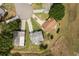Aerial view of a home situated on a well-manicured lot with mature trees at 25818 Belle Alliance, Leesburg, FL 34748