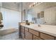 Bathroom with floral wallpaper, a large mirror, and shower with a white curtain at 25818 Belle Alliance, Leesburg, FL 34748