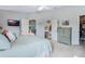 Spacious main bedroom with en-suite bath and walk-in closet access provides a private and functional living space at 25818 Belle Alliance, Leesburg, FL 34748
