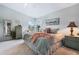 Serene main bedroom features calming colors, soft carpet, and ample natural light, creating a relaxing retreat at 25818 Belle Alliance, Leesburg, FL 34748