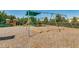 Community playground featuring a green slide and swing set, perfect for outdoor fun at 2988 Santa Maria Ave, Clermont, FL 34715