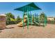 A neighborhood playground featuring a slide, climbing bars, and a shaded canopy at 2988 Santa Maria Ave, Clermont, FL 34715