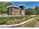 Verde Ridge community sign amid well-manicured landscaping and a stone wall at 2988 Santa Maria Ave, Clermont, FL 34715