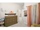 Inviting Bedroom with changing table and diaper caddy at 3193 Hill Point St, Minneola, FL 34715