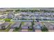 Beautifully kept home with a brick driveway and lush green landscaping in a lovely neighborhood at 3193 Hill Point St, Minneola, FL 34715
