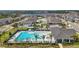 Aerial view of the beautiful community pool and clubhouse with lots of room for residents at 3193 Hill Point St, Minneola, FL 34715