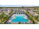 Resort-style pool area with ample seating, perfect for relaxation and entertainment in a luxurious setting at 3193 Hill Point St, Minneola, FL 34715