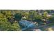 Charming home with a fenced yard, offering a serene and private setting surrounded by lush trees at 36337 Terra Ct, Grand Island, FL 32735