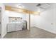 Practical laundry area with a washer, dryer, and water heater for convenience at 36337 Terra Ct, Grand Island, FL 32735