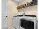 Convenient laundry room with washer and dryer, providing functional space for laundry needs at 3641 Arlington Ridge Blvd, Leesburg, FL 34748