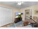 Inviting living room featuring comfortable seating, a large TV, and a seamless flow to adjacent spaces at 3641 Arlington Ridge Blvd, Leesburg, FL 34748