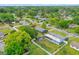 A lush, verdant neighborhood view, showcasing a charming home among tree-lined streets at 375 N Boyd St, Winter Garden, FL 34787