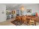 Dining area with modern lighting, decor and opening to the kitchen at 375 N Boyd St, Winter Garden, FL 34787