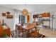 The dining area has vintage decor and natural light from the outdoor sliding door at 375 N Boyd St, Winter Garden, FL 34787