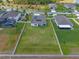 Drone shot displaying the property, its fencing, landscaping, and location within a neighborhood setting at 4131 Sunset Preserve Blvd, Orlando, FL 32820