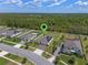 An aerial view highlights the property's location with a sprawling wooded area in the background at 4131 Sunset Preserve Blvd, Orlando, FL 32820