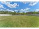 Spacious backyard surrounded by a white fence, offering privacy and ample space at 4131 Sunset Preserve Blvd, Orlando, FL 32820
