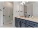 Stylish bathroom with a modern vanity, sleek fixtures, and a glass-enclosed shower at 4131 Sunset Preserve Blvd, Orlando, FL 32820