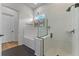 Modern bathroom featuring a soaking tub, walk-in shower, and sleek finishes for spa-like comfort at 4131 Sunset Preserve Blvd, Orlando, FL 32820