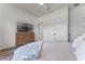 Comfortable bedroom with natural light, light colored walls, and modern touches at 4131 Sunset Preserve Blvd, Orlando, FL 32820