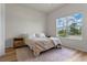 Inviting bedroom with a soft rug and large windows offering a scenic view at 4131 Sunset Preserve Blvd, Orlando, FL 32820