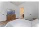 Inviting bedroom featuring a modern console and convenient access to the ensuite bathroom at 4131 Sunset Preserve Blvd, Orlando, FL 32820