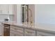 Beautiful Kitchen with quartz countertops, large sink and modern goose neck faucet at 4131 Sunset Preserve Blvd, Orlando, FL 32820
