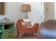 Cozy reading nook offers eclectic furnishing and plenty of natural light at 4131 Sunset Preserve Blvd, Orlando, FL 32820