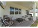 Comfortable outdoor patio featuring stylish seating and entertainment area for outdoor enjoyment at 4131 Sunset Preserve Blvd, Orlando, FL 32820