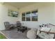 Inviting outdoor patio area with stylish seating, fire pit and great light at 4131 Sunset Preserve Blvd, Orlando, FL 32820