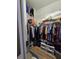 Organized walk-in closet with ample shelving and hanging space at 5008 Sawgrass Lake Cir, Leesburg, FL 34748