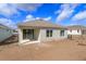 This home features an expansive backyard with a sliding glass door leading to the patio at 5511 Nickerbean St, Apopka, FL 32712