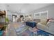 Open living space connects the kitchen, dining, and living areas for easy entertaining at 5549 Millican Ave, The Villages, FL 32163