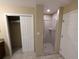 Bathroom showing the walk-in shower and closet at 8801 Worldquest Blvd # 4203, Orlando, FL 32821