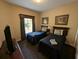 A welcoming bedroom showcasing twin beds, soft lighting, and tasteful decor at 8801 Worldquest Blvd # 4203, Orlando, FL 32821