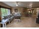 Spacious living room leads to dining area and kitchen, all with tile flooring at 8801 Worldquest Blvd # 4203, Orlando, FL 32821