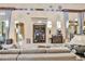 Spacious lobby area with ample seating, elegant decor, and large windows for natural light at 8801 Worldquest Blvd # 4203, Orlando, FL 32821