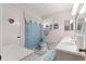 Cozy bathroom featuring pink walls, blue accents, a toilet, and a vanity sink at 9773 Se 179Th Pl, Summerfield, FL 34491
