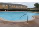 Resort-style community pool featuring easy-access steps and ample space for swimming and lounging at 1010 Chelsea Dr, Davenport, FL 33897