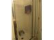 A shower featuring a glass door and a built-in seat for added convenience at 1010 Chelsea Dr, Davenport, FL 33897