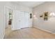 Bright bedroom features natural light, closet, and wood floors at 1022 Saint Ives Ct, Mount Dora, FL 32757