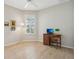 Bright bedroom with ample natural light and a computer desk; ideal for work or study at 1022 Saint Ives Ct, Mount Dora, FL 32757