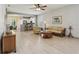 Open-concept living space with seamless flow to the kitchen and dining area at 1022 Saint Ives Ct, Mount Dora, FL 32757
