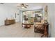 Spacious living room area showcasing an open layout and natural light throughout at 1022 Saint Ives Ct, Mount Dora, FL 32757
