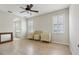 The main bedroom features bright windows with shutters, ample floor space, and an ensuite bath for convenience at 1022 Saint Ives Ct, Mount Dora, FL 32757