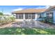 Backyard patio with screened in porch at 10257 Dovehill Ln, Clermont, FL 34711