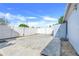 Large driveway and gate leading to backyard at 10257 Dovehill Ln, Clermont, FL 34711