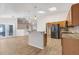 Open kitchen featuring stainless steel appliances, granite countertops, and an open flow to living areas at 10257 Dovehill Ln, Clermont, FL 34711