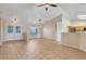 Open-concept living room with tile floors and natural light at 10257 Dovehill Ln, Clermont, FL 34711